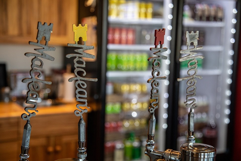 Steel tap handles in a bar.