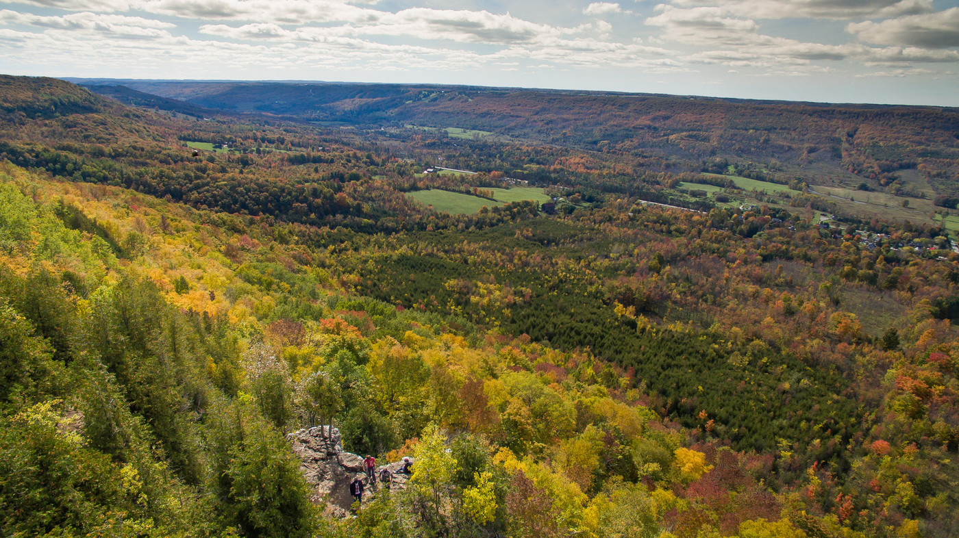Landscape of mountainous landform with color changing trees from the fall season 