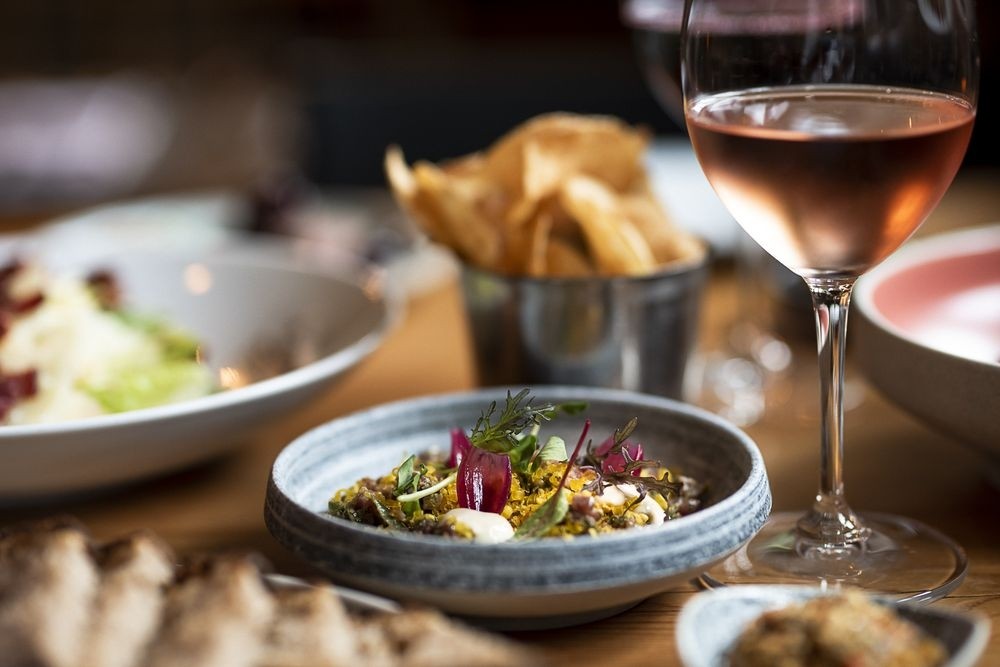 food and wine on wooden table