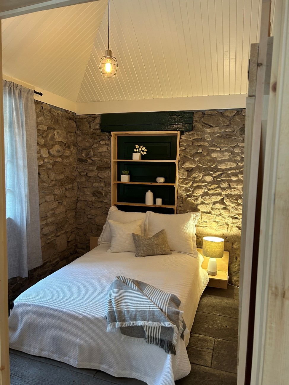 A bedroom inside a cabin.