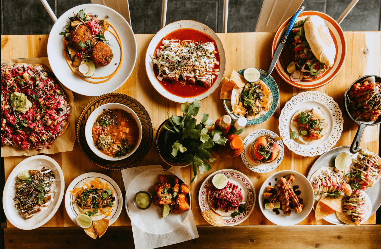 Table full of food plates