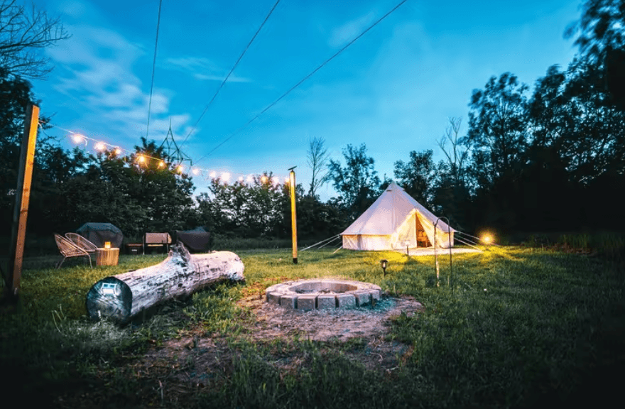 A wide perspective of a beautiful camp ground at night