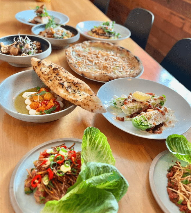 a table full of beautiful plates of food