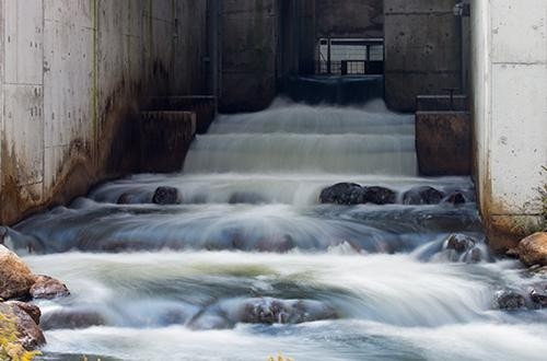 Long exposure image of water flowing down a fish ladder.