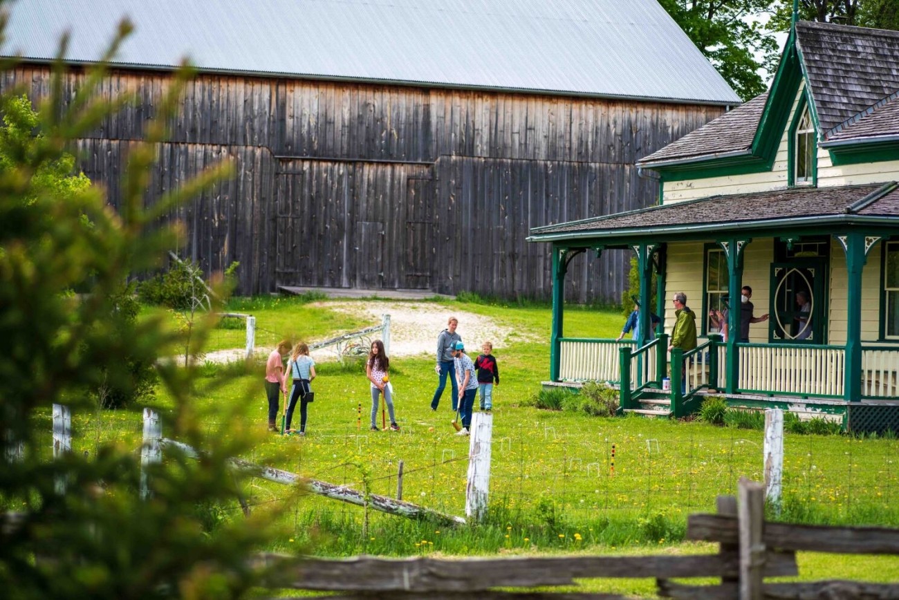People playing in Moreston Heritage Village